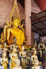 Golden foil on buddha statue in temple