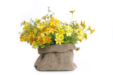 Artificial flowers in cloth bag