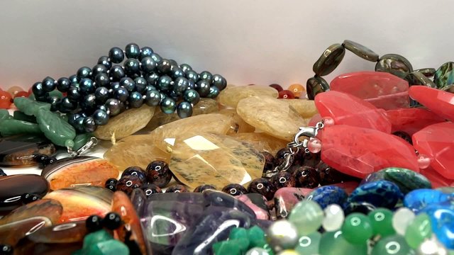 semigem necklaces and beads jewelery as fashion background