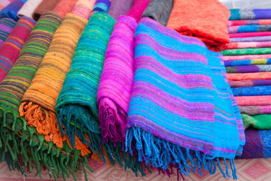 Pile of gentle folded scarfs, Pokhara, Nepal.