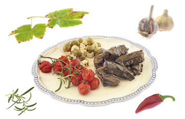 Vine leaves with olives, greek cheese and vegetables