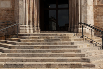 Fototapeta na wymiar Stone staircase with a handrail
