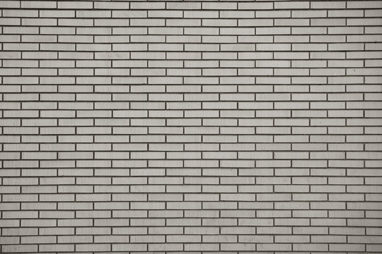 Brick wall, built of flat bricks