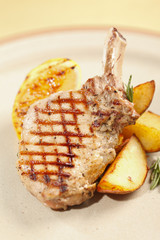 Grilled meat ribs with potatoes