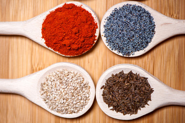 Assortment of spices with milled dried hot pepper, sesame, poppy