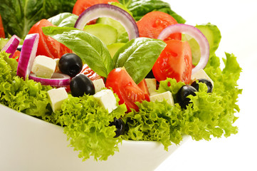 Vegetable salad bowl isolated on white