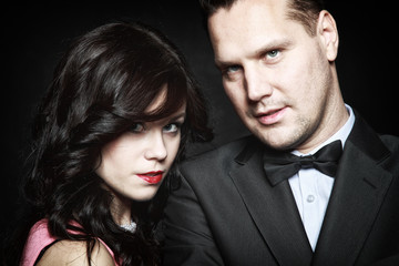 attractive retro couple on black background