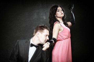 attractive retro couple on black background