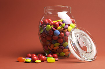 Glass Jar full of bright colorful candy
