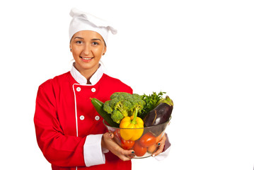 Chef woman with vegetables