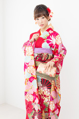 Beautiful asian kimono woman on white background