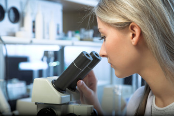 researcher with microscope