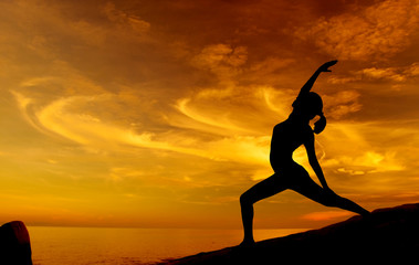 Sunrise yoga at beach