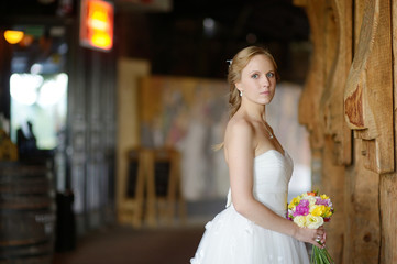 Fototapeta premium Indoor portrait of a beautiful young bride