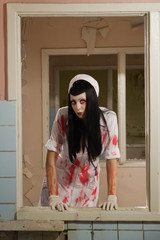 Horror movie. Crazy dead nurse