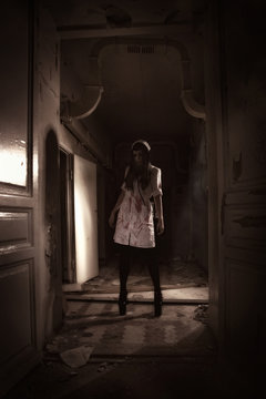 Horror movie. Crazy dead nurse