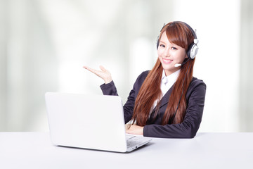 Business woman wearing headset with smile