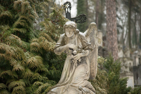 Weeping angel tombstone in famous Lychakiv Cemetery, Lviv