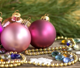 Pink colour christmas ornament background (selective focus)