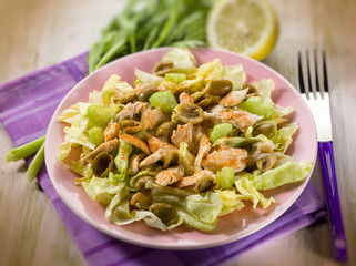 chicken salad with lettuce celery paprika and olives, selective
