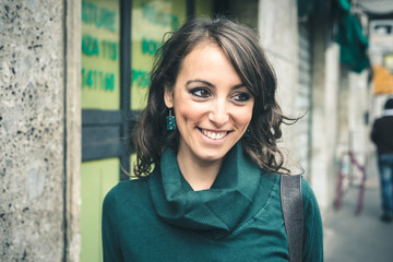 beautiful woman with turtleneck walking in the city