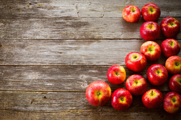 apples on wooden table
