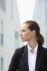 Young businesswoman looking away