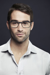 Portrait of mid adult man wearing glasses