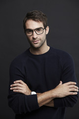 Fototapeta premium Portrait of mid adult man in glasses, studio