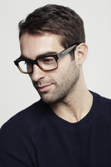 Obraz premium Portrait of mid adult man in glasses