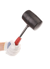 Hand holding black hammer.