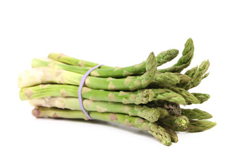 Fresh green asparagus tied up.
