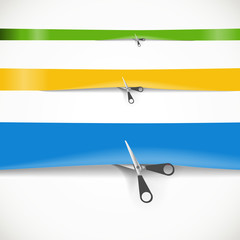 Scissors cutting the red advertising ribbon