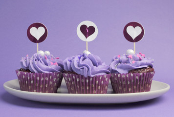 Mauve purple decorated cupcakes with hearts