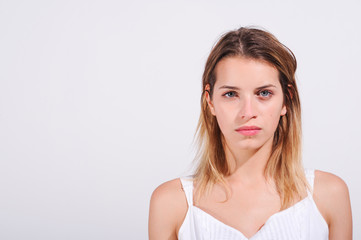 Closeup of a young girl serious and angry