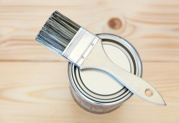 Paint brushes on wooden planks