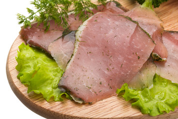 Ripe fresh ham with vegetables