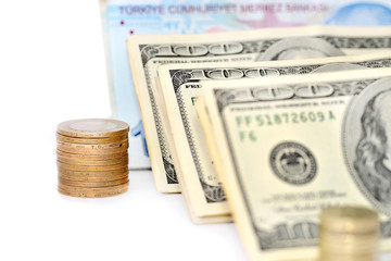 turkish coins and dollar banknote on white background