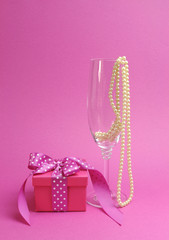 Pretty pink and feminine gift with champagne pearls