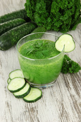 Green vegetable juice on table close-up