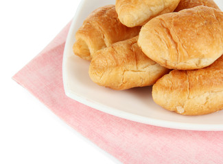 Tasty croissants on plate close-up