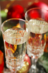 Composition with two champagne glasses, close-up