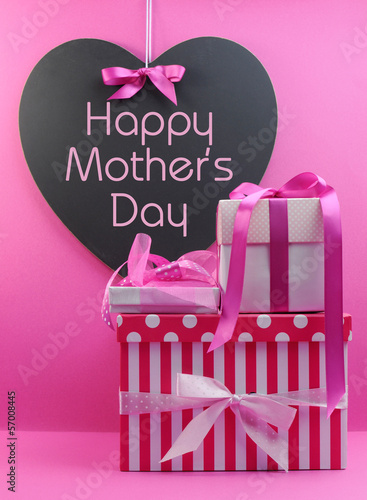 Stack of beautiful pink gifts for Happy Mothers Day