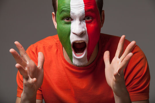 Italian Football Fan With Painted Face Screaming