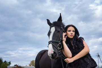 Obraz premium beautiful woman with horse