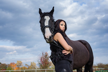 Naklejka premium beautiful woman with horse