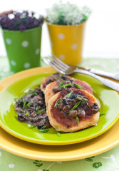 Potato pancakes with mushroom sauce