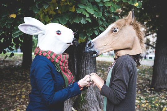 horse and rabbit mask women in the park