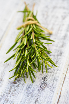 Rosemary herbs on the wooden table