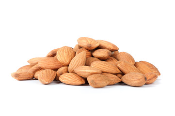 Heap of almond nuts isolated on white background